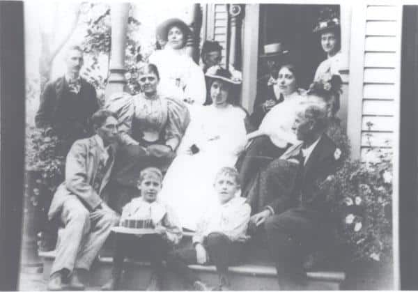 The Peddle family poses for a photograph on a porch in Terre Haute, Indiana in late August 1896