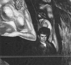 a photo of Wilson in front of his mural